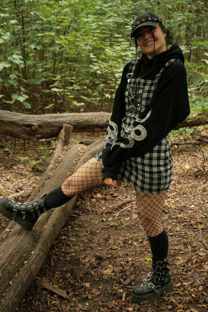CHECKERED AND CHAINED