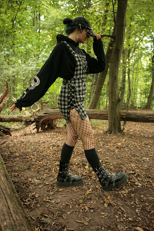 CHECKERED AND CHAINED