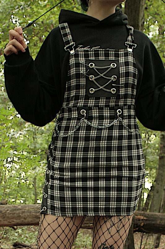 CHECKERED AND CHAINED